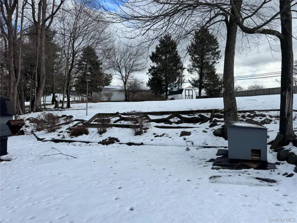 a view of a backyard of a house