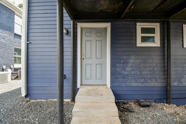 a front view of a house with a door