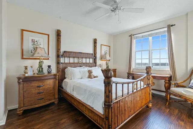 a bed room with a bed and a window