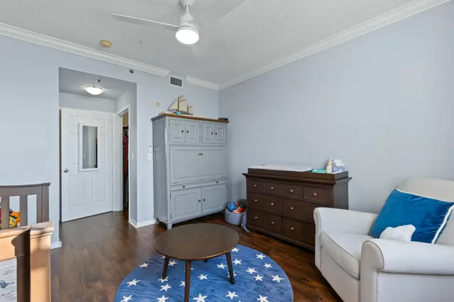 a room with furniture and wooden floor