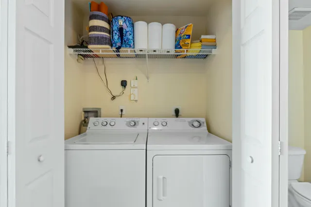 a utility room with dryer and washer