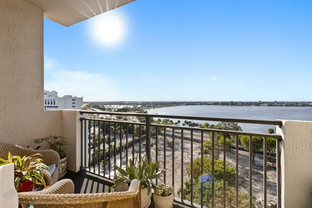 a view of balcony with furniture