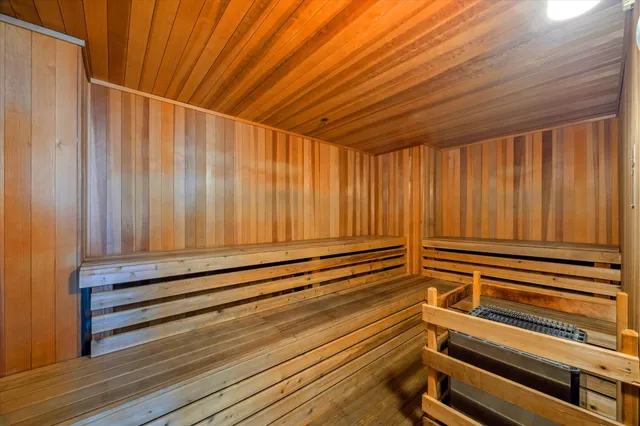 a view of room with stairs and a rug