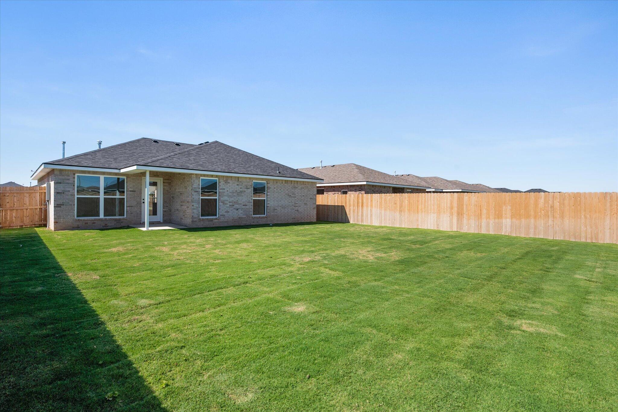 1320 North Colton Avenue Lubbock, TX 79416 - Photo 22 of 22 a front view of a house with a garden