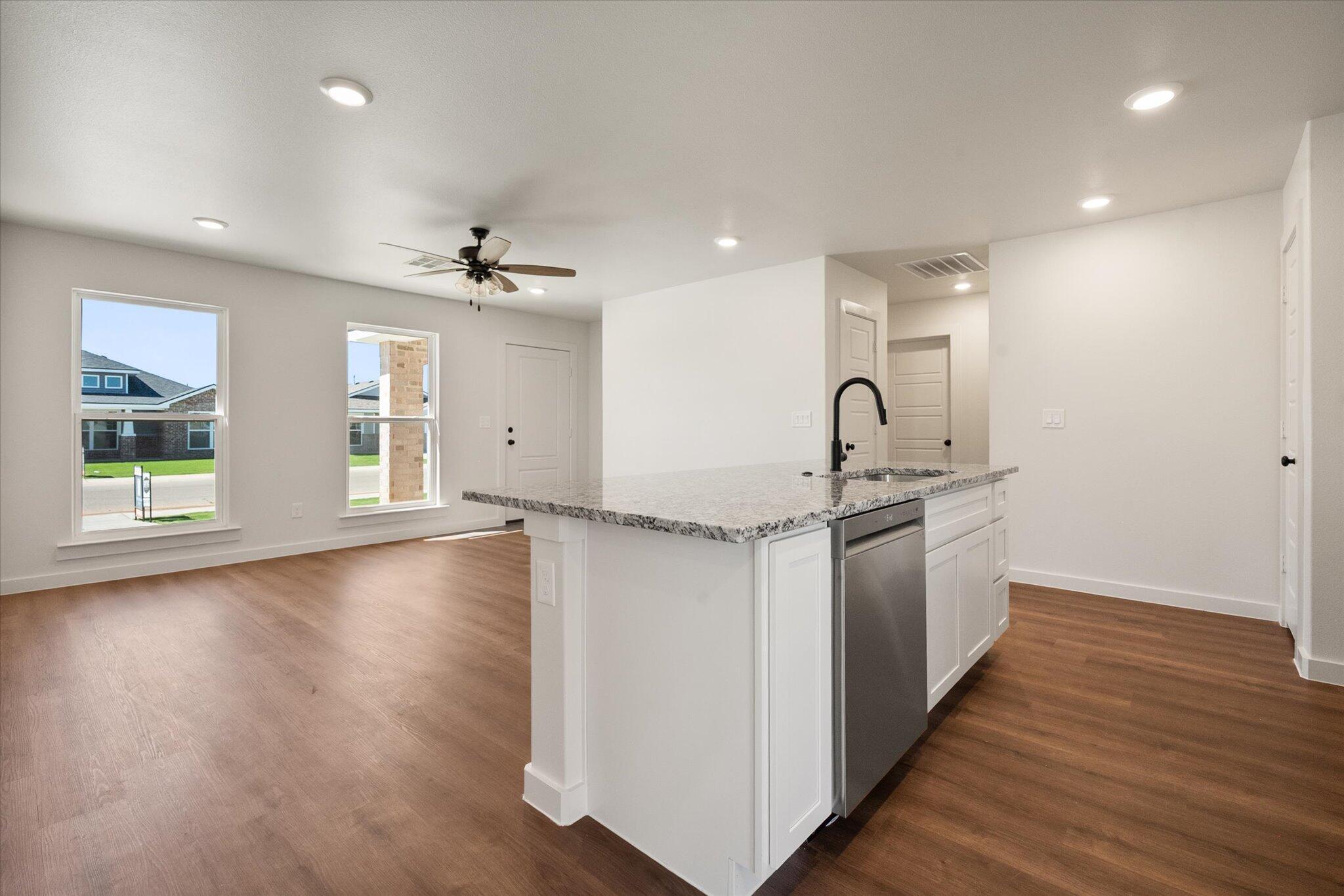 1320 North Colton Avenue Lubbock, TX 79416 - Photo 10 of 22 a kitchen with sink and cabinets