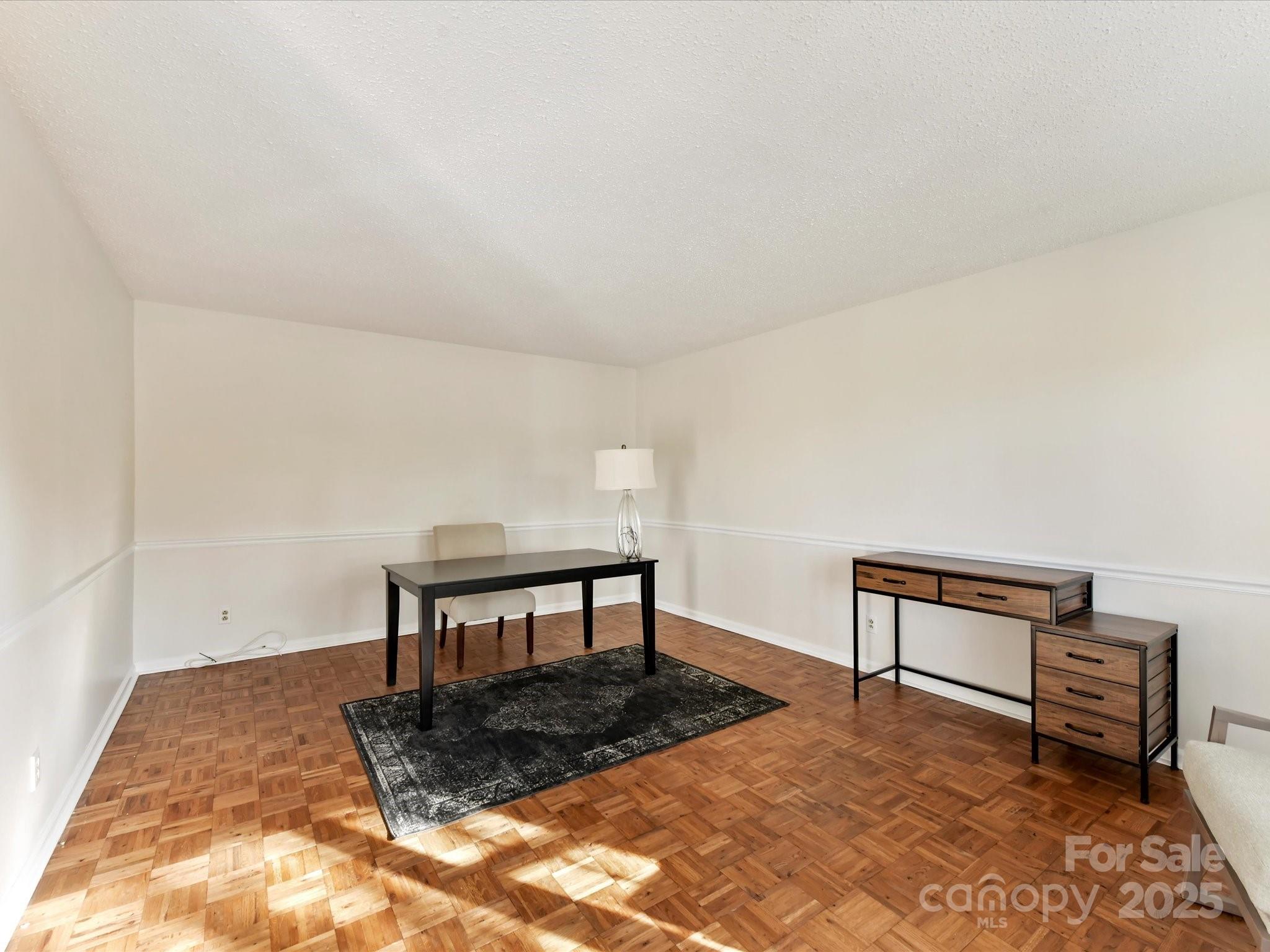 6313 Mill Grove Road Indian Trail, NC 28079 - Photo 12 of 47 a living room with furniture and a wooden floor
