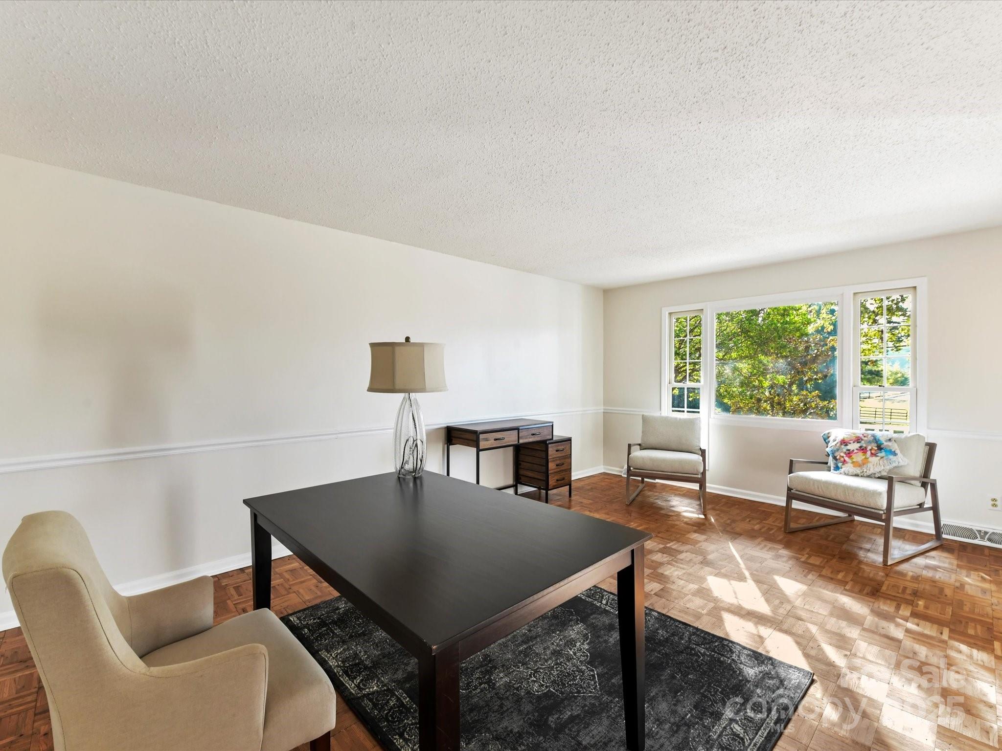 6313 Mill Grove Road Indian Trail, NC 28079 - Photo 13 of 47 a view of a livingroom with furniture and window