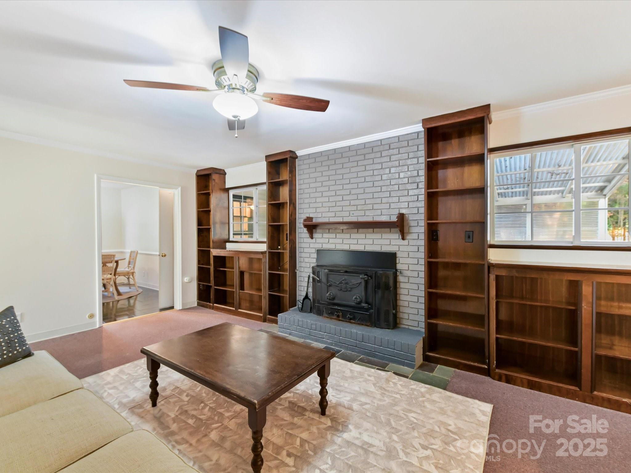 6313 Mill Grove Road Indian Trail, NC 28079 - Photo 17 of 47 a living room with furniture a fireplace and a rug