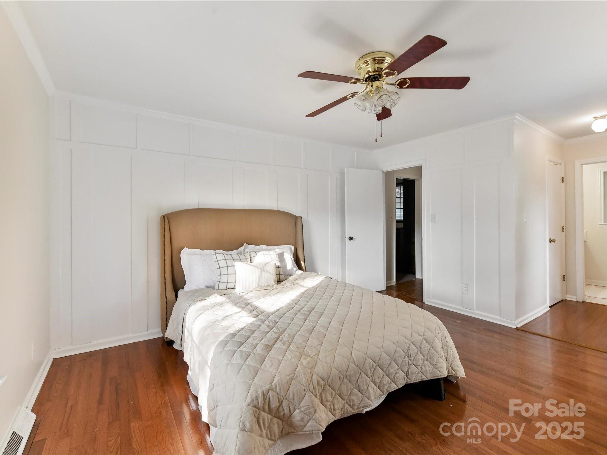 6313 Mill Grove Road Indian Trail, NC 28079 - Photo 26 of 47 a bedroom with a bed and a ceiling fan