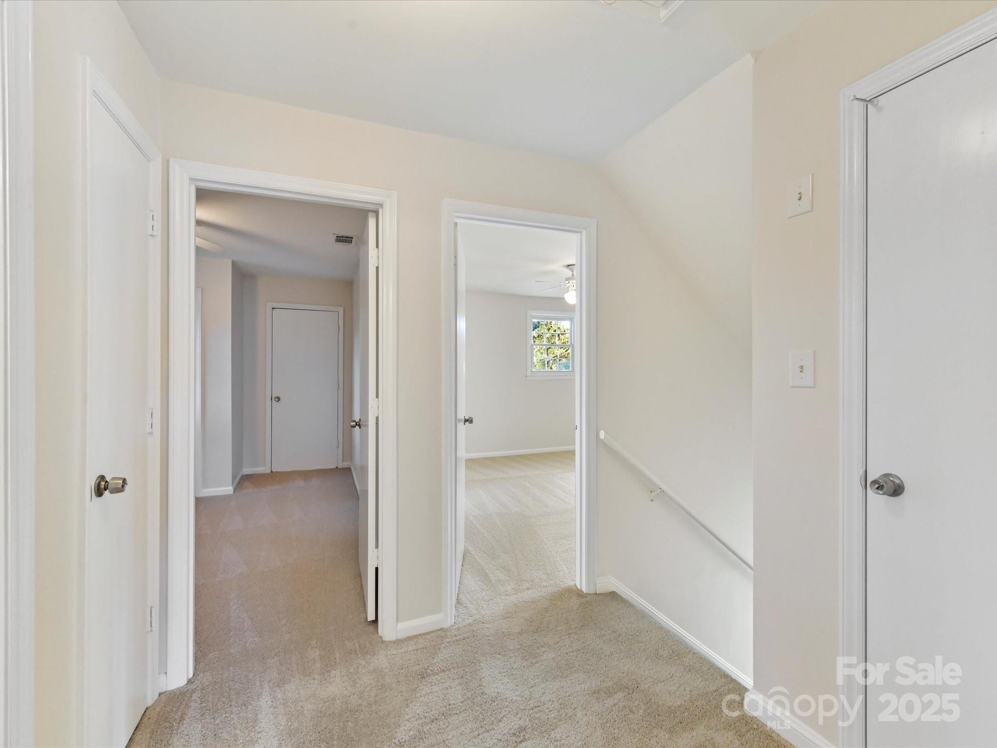 6313 Mill Grove Road Indian Trail, NC 28079 - Photo 30 of 47 a view of a hallway with wooden floor