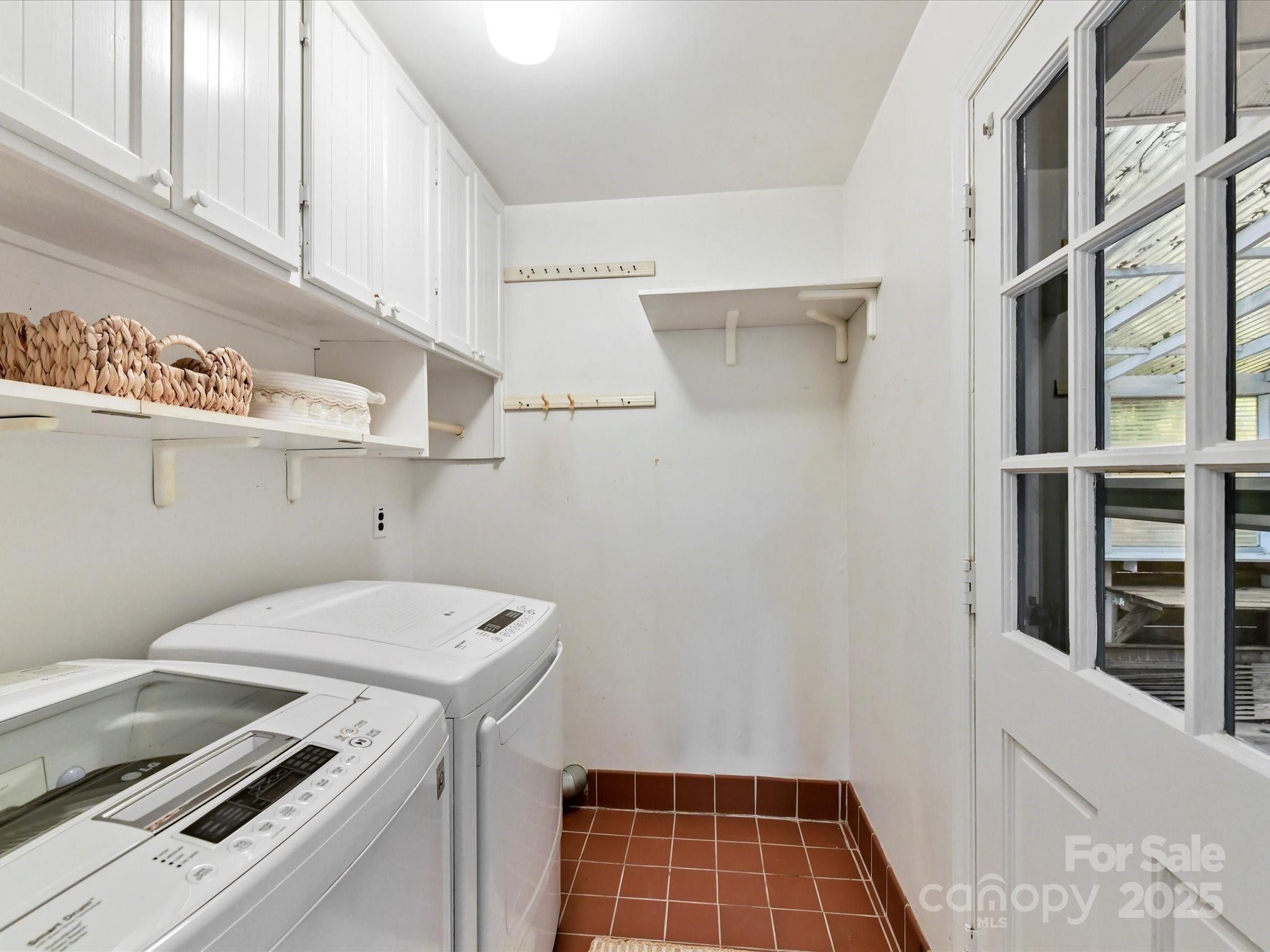 6313 Mill Grove Road Indian Trail, NC 28079 - Photo 38 of 47 a utility room with dryer and washer