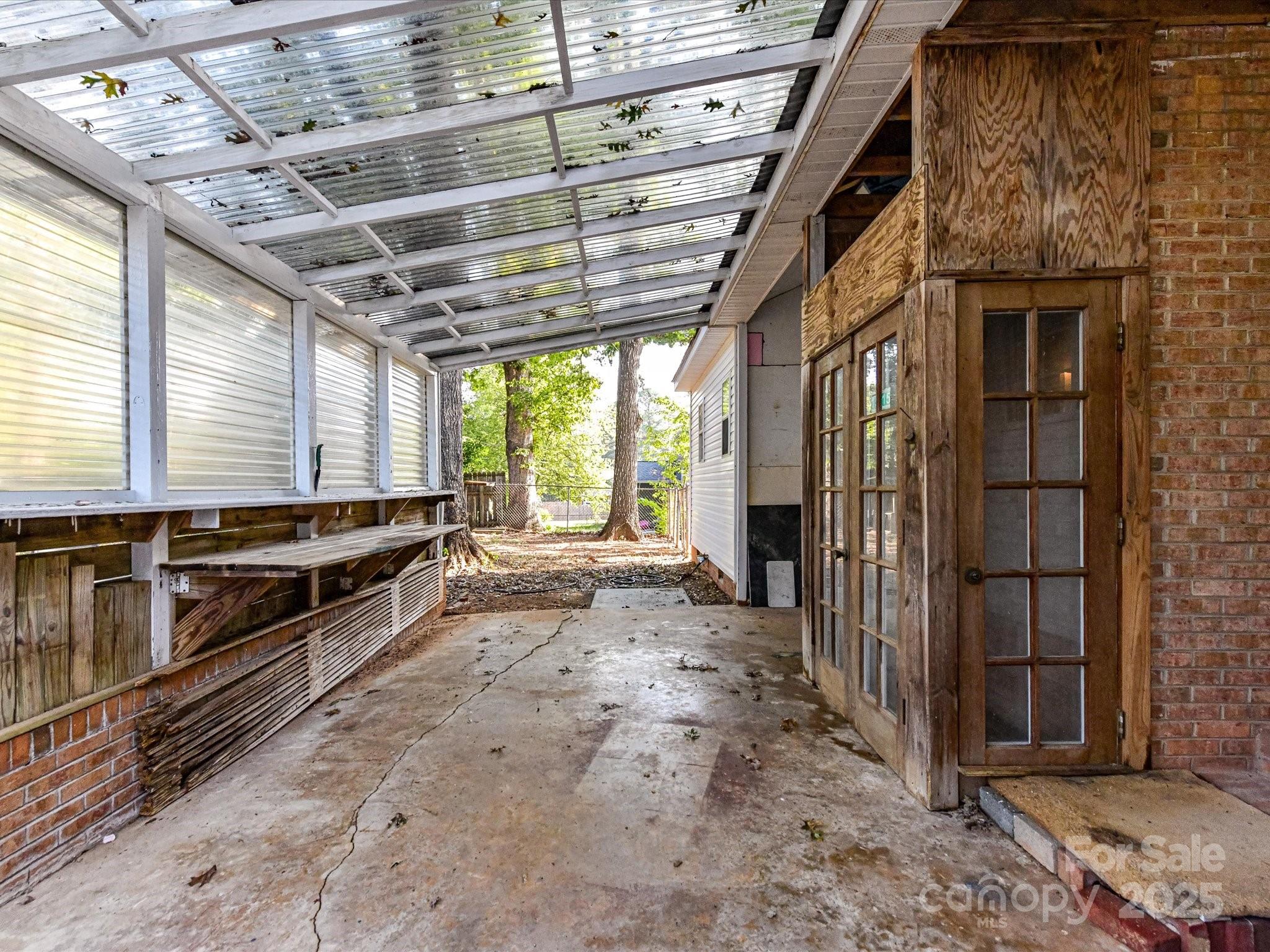 6313 Mill Grove Road Indian Trail, NC 28079 - Photo 40 of 47 a view of a room with wooden walls