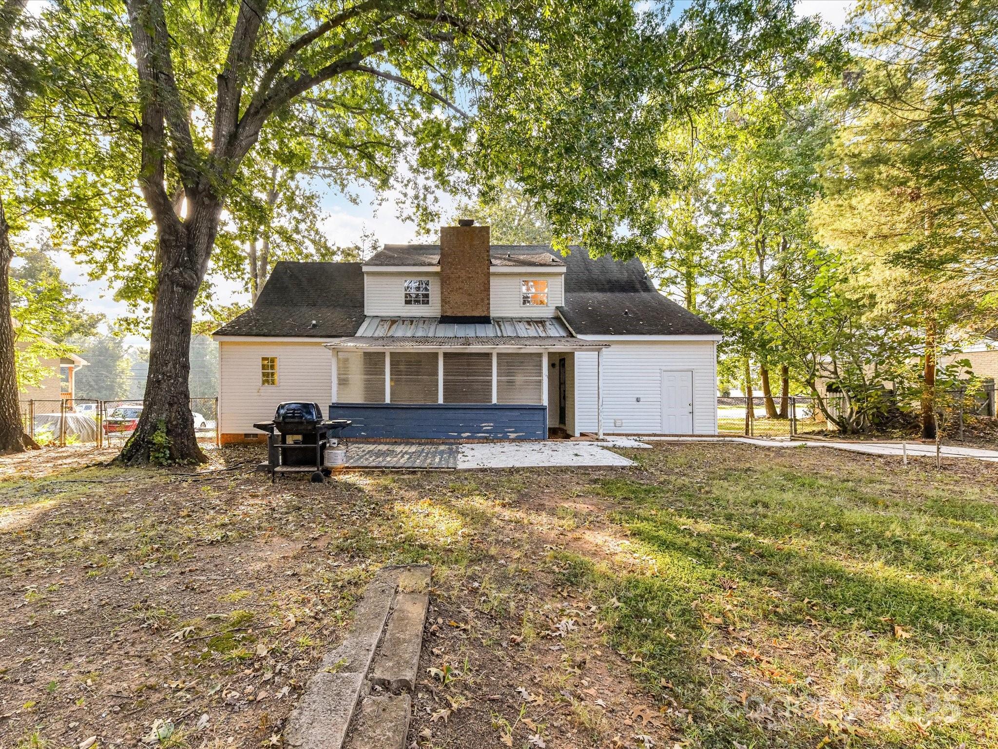 6313 Mill Grove Road Indian Trail, NC 28079 - Photo 47 of 47 a view of a house with a yard