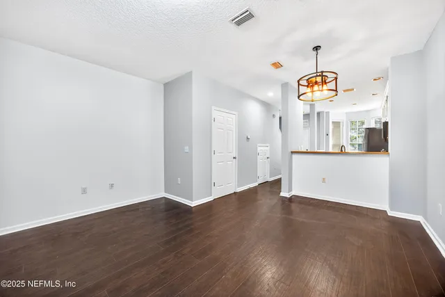 a view of a storage & utility room with wooden floor