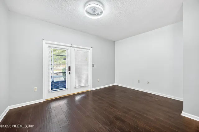 a kitchen with stainless steel appliances granite countertop a sink stove and microwave