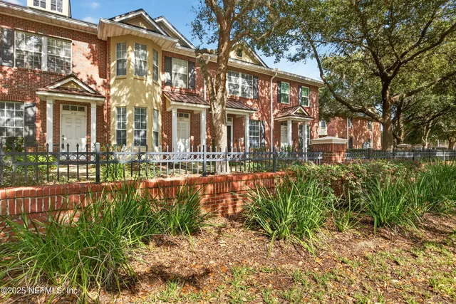 front view of a building with a yard