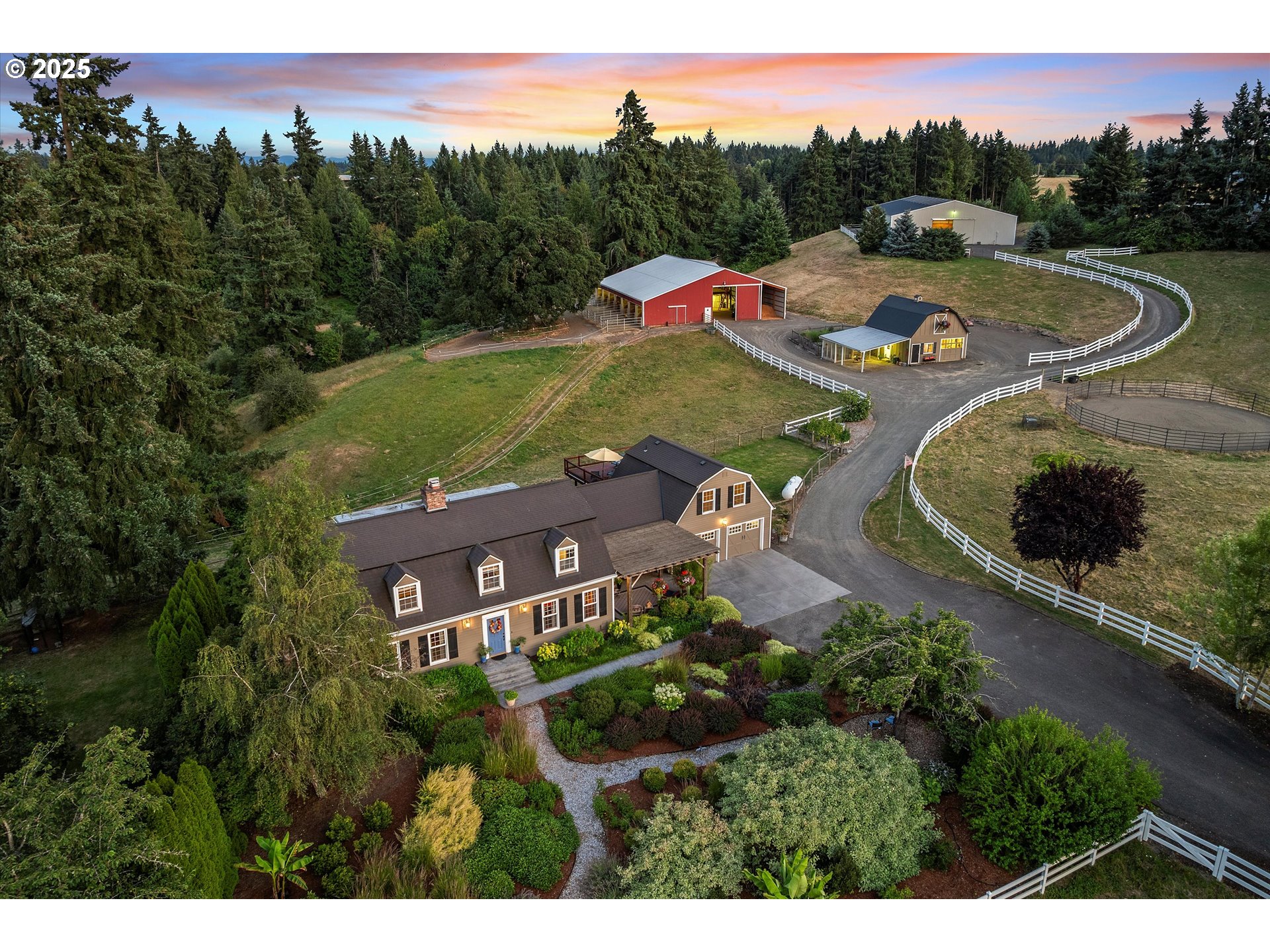 an aerial view of a house with a garden