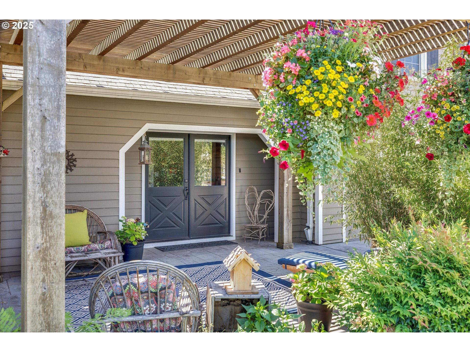11800 South Carus Road Canby, OR 97013 - Photo 24 of 45 a front view of a house with a yard