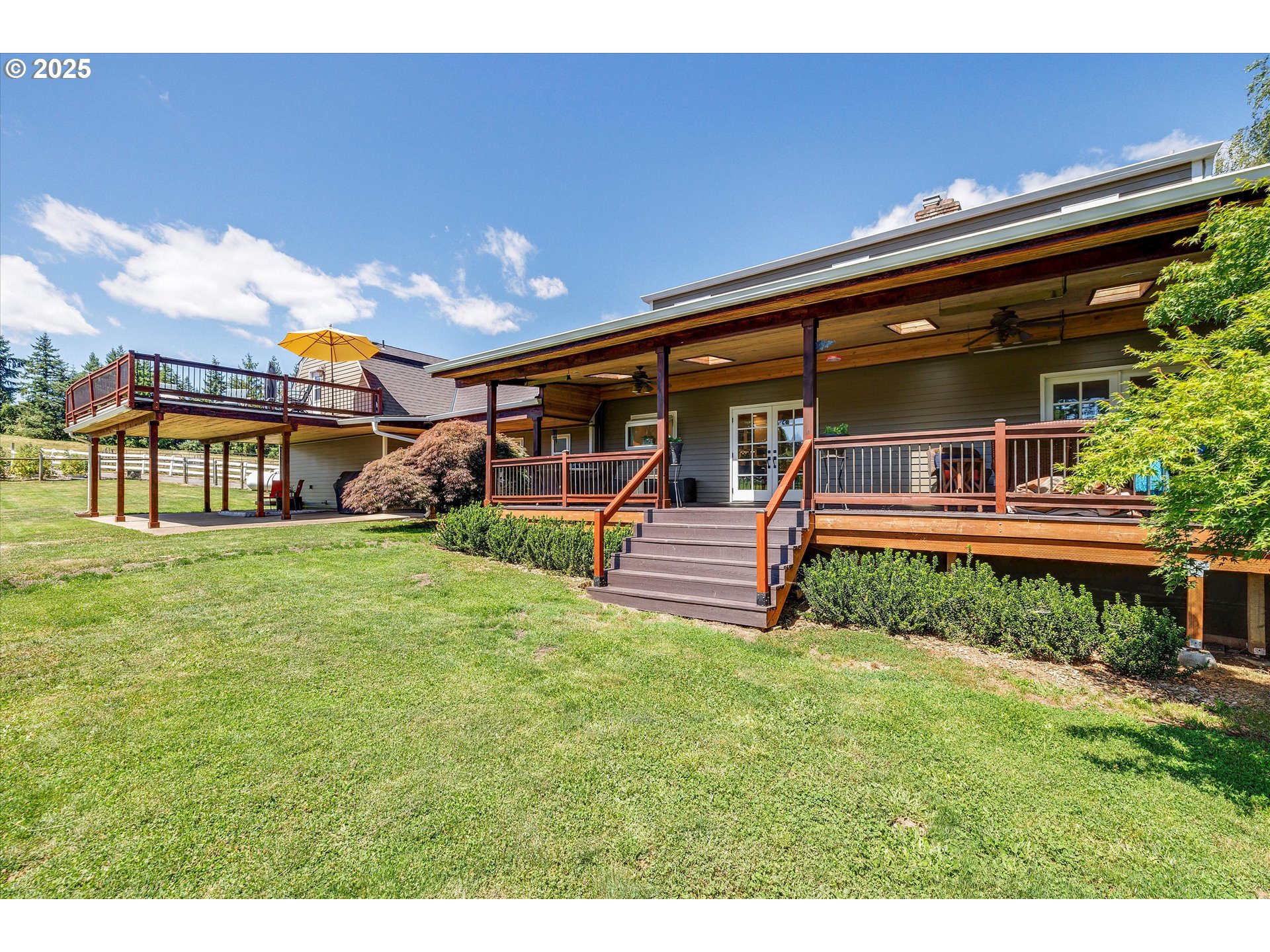11800 South Carus Road Canby, OR 97013 - Photo 26 of 45 a front view of a house with garden