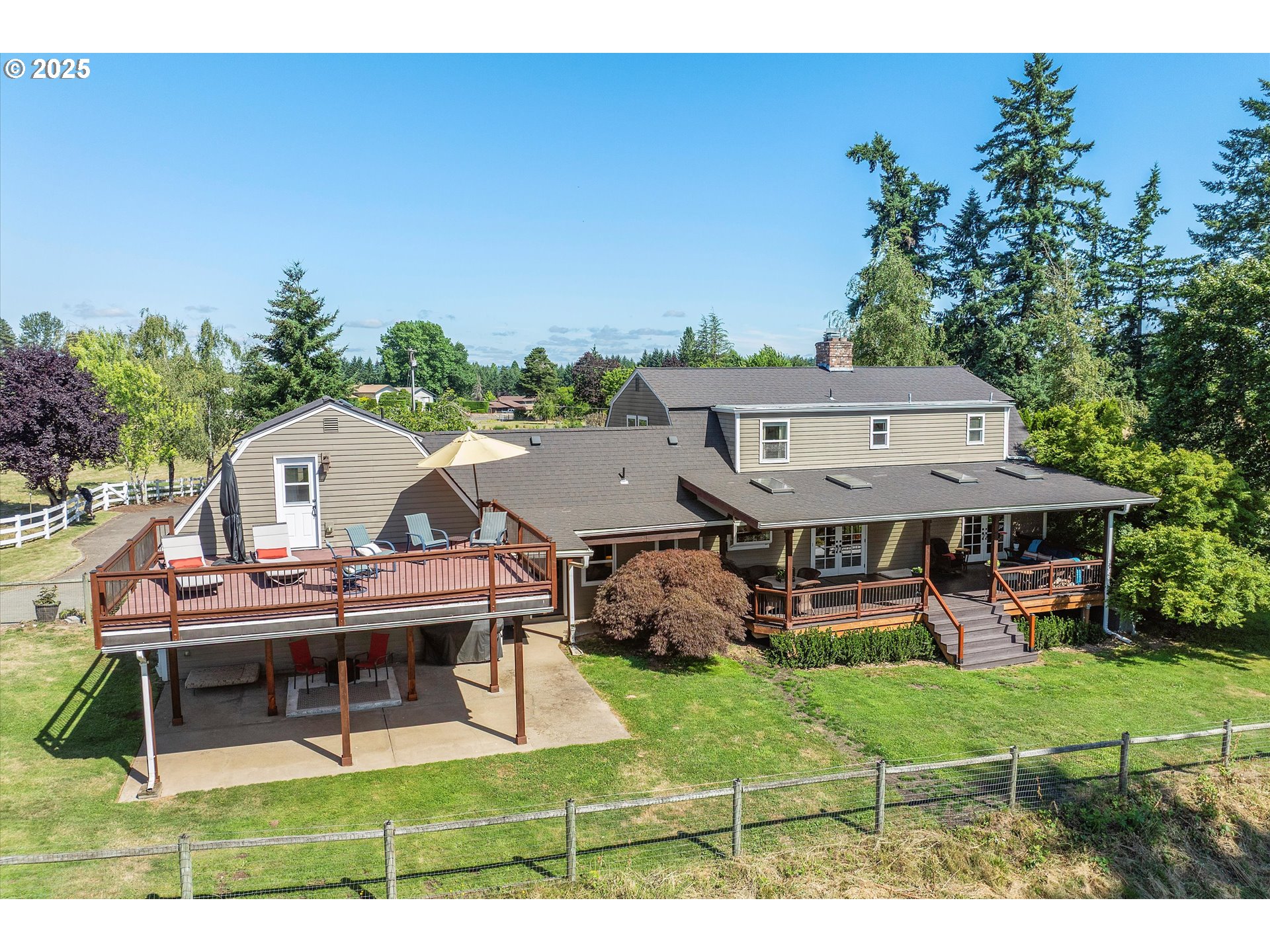 11800 South Carus Road Canby, OR 97013 - Photo 7 of 45 an aerial view of a house with swimming pool garden view and a couple of chairs