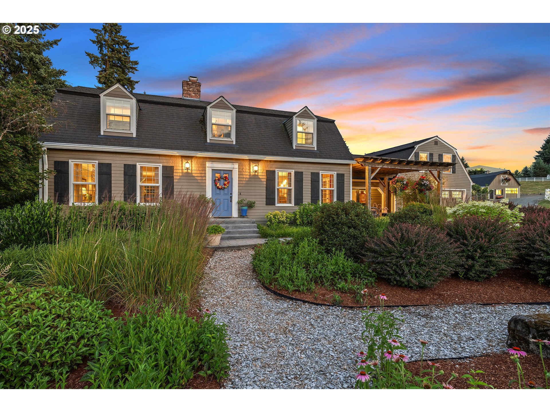 11800 South Carus Road Canby, OR 97013 - Photo 8 of 45 a front view of a house with a garden