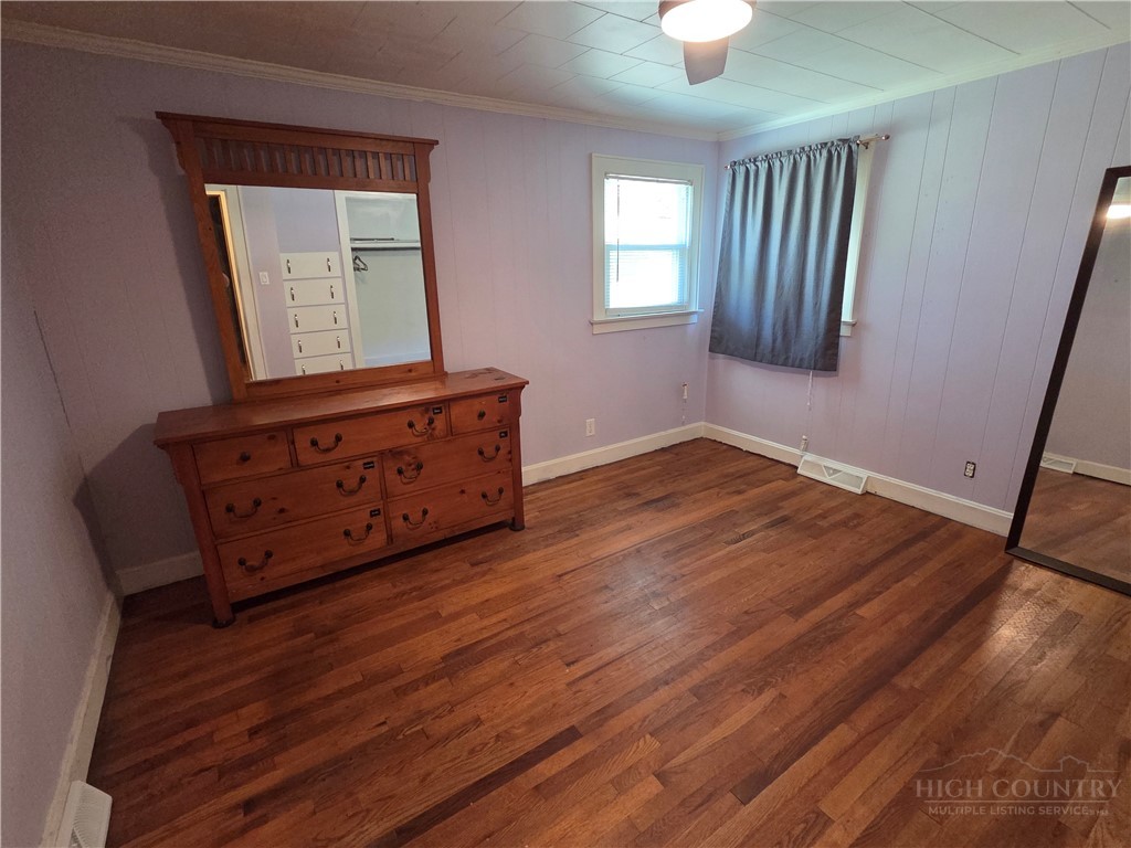 145 Black Oak Ridge Road Taylorsville, NC 28681 - Photo 20 of 39 a view of a room with wooden floor and window