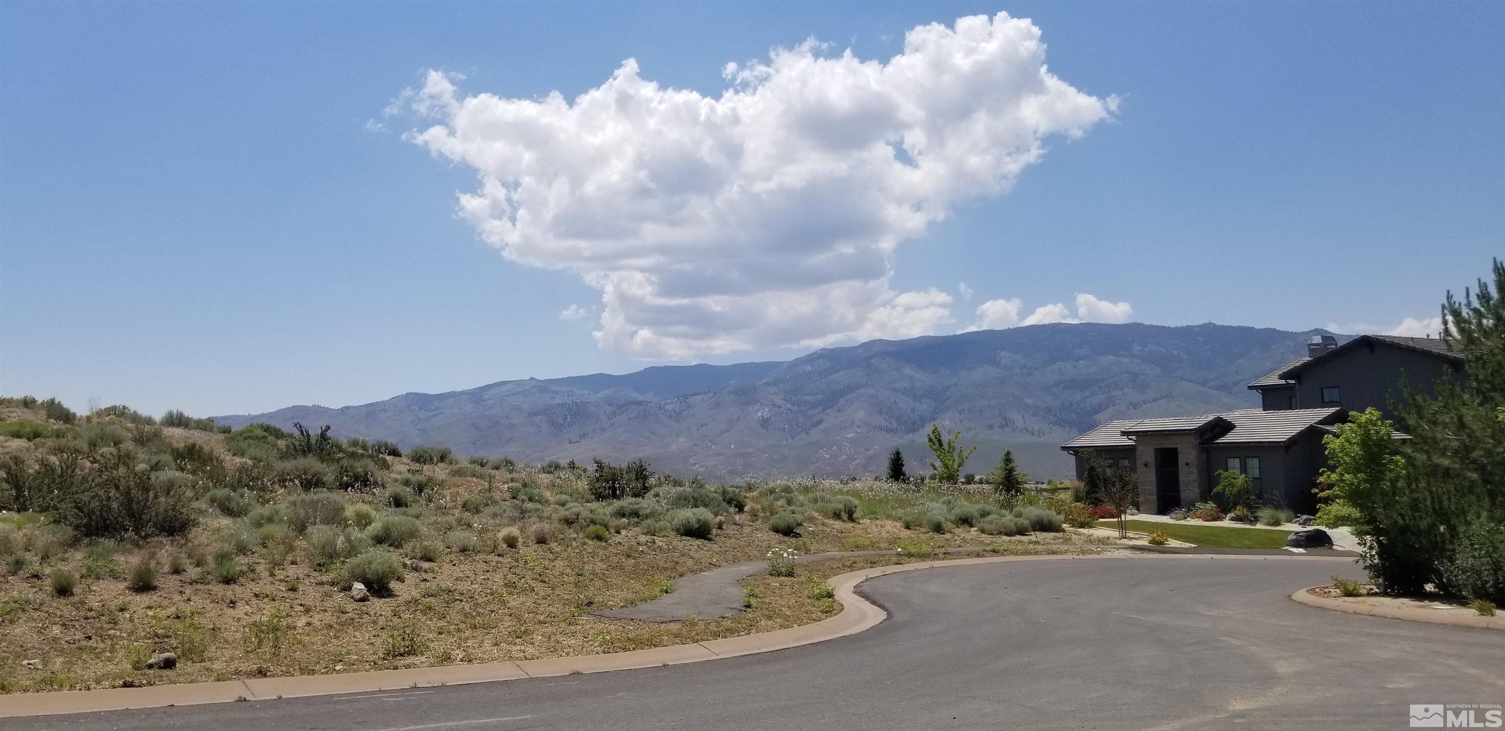 2275 Eagle Bend Court Reno, NV 89523 - Photo 7 of 9 a view of a house with a yard and a garden