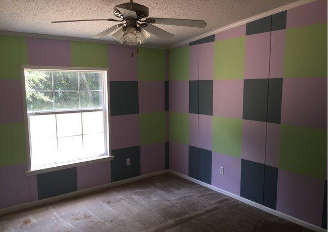 1054 Reeves Road Baker, FL 32531 - Photo 12 of 14 a view of an empty room with window and fan