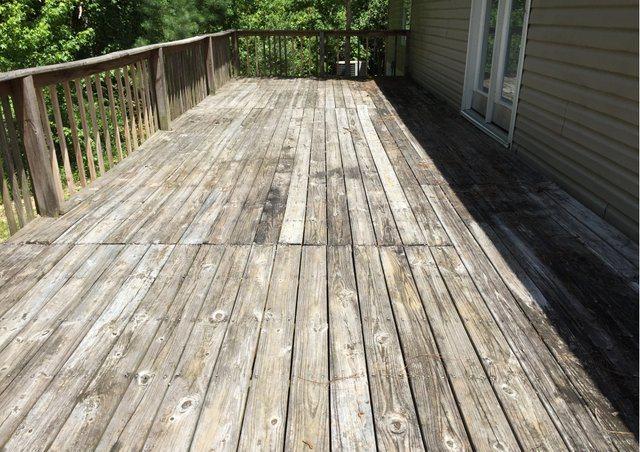 1054 Reeves Road Baker, FL 32531 - Photo 13 of 14 a view of balcony with wooden floor
