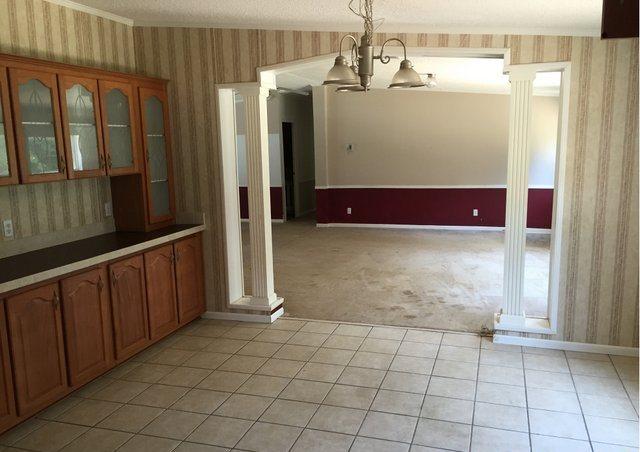 1054 Reeves Road Baker, FL 32531 - Photo 4 of 14 a view of a utility room with windows