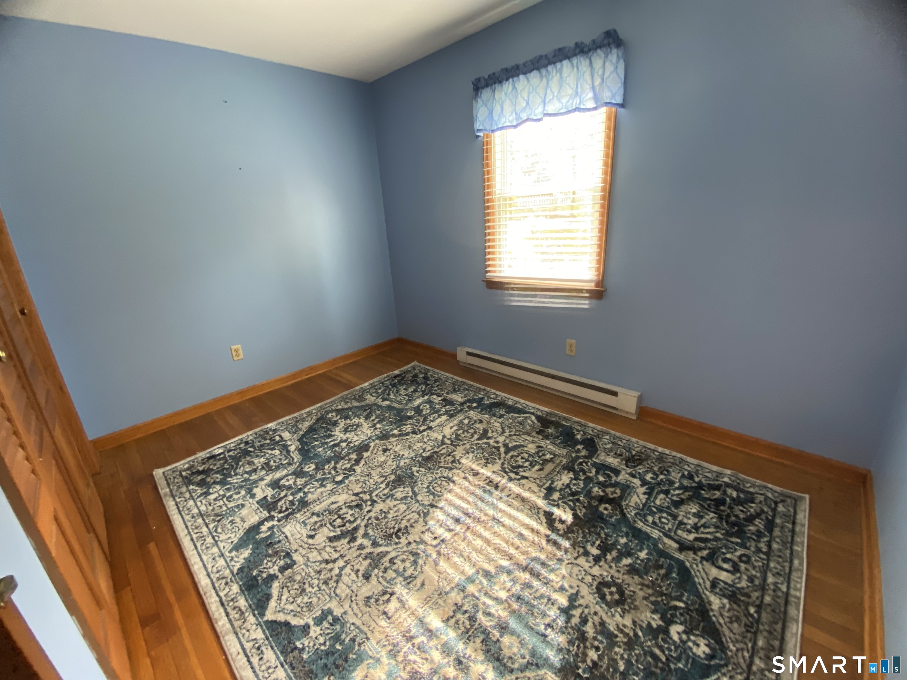 268 Bell Street Middletown, CT 06457 - Photo 15 of 36 a view of a room with wooden floor and window