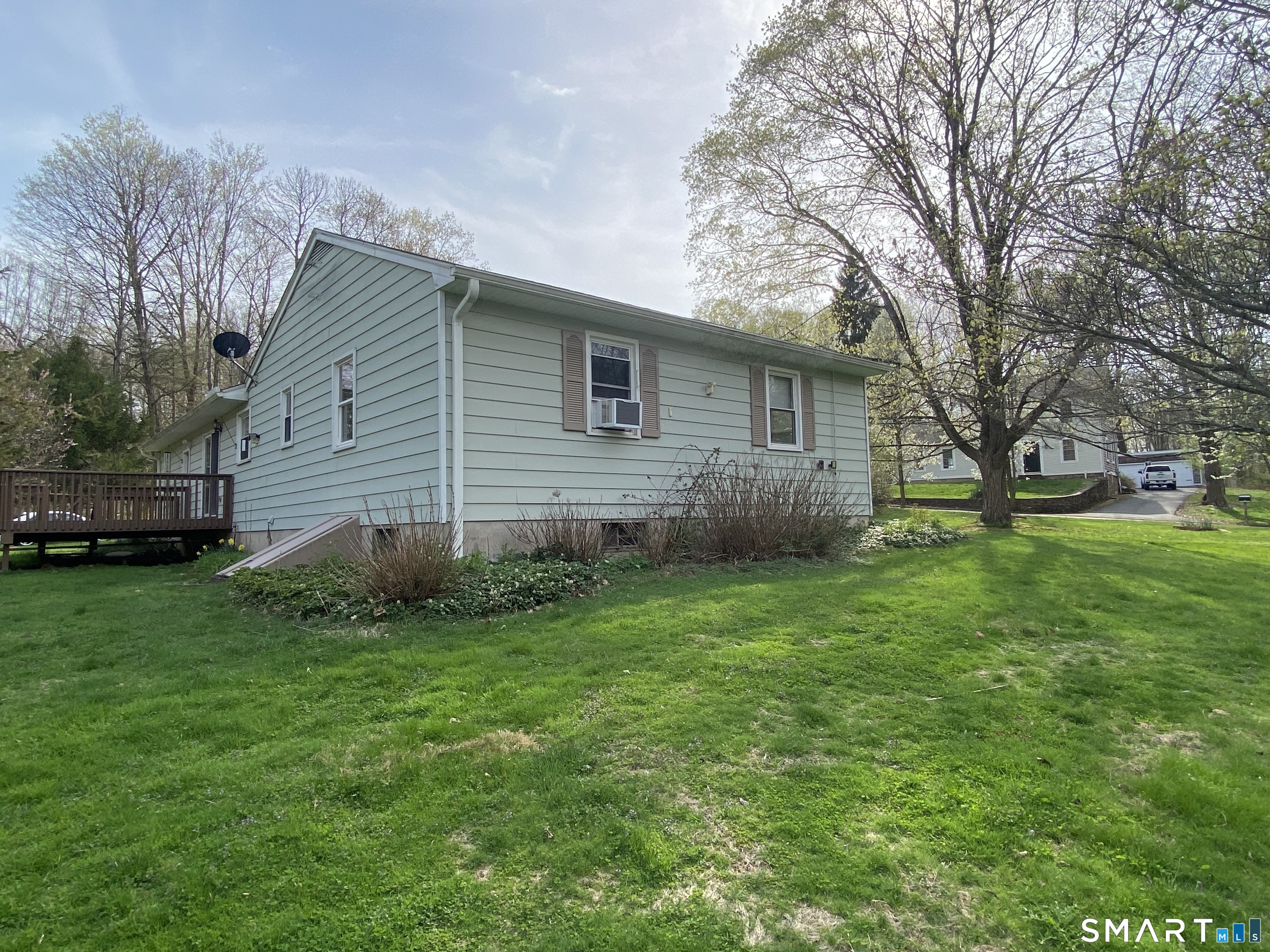 268 Bell Street Middletown, CT 06457 - Photo 24 of 36 a view of a house with a yard
