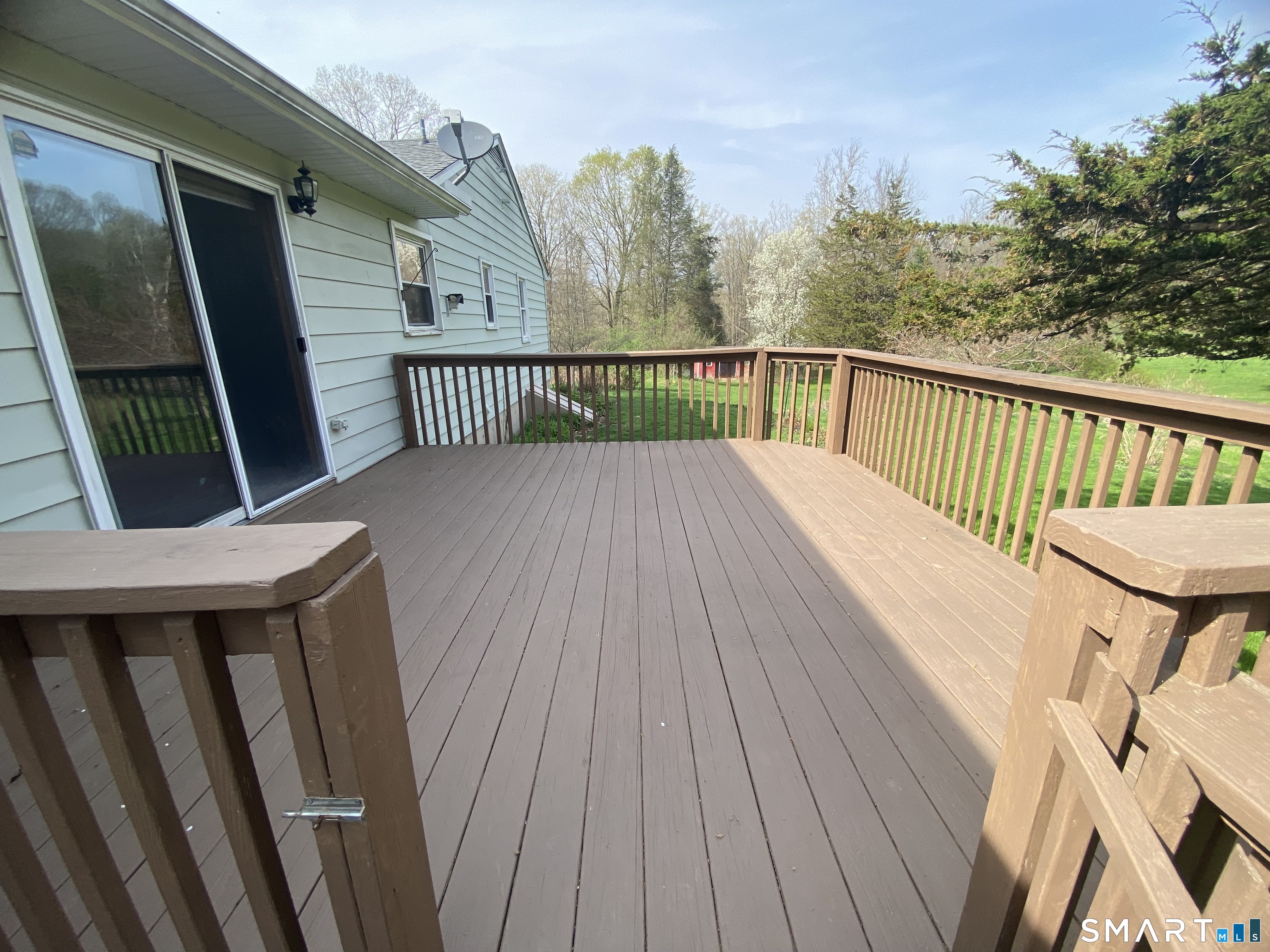 268 Bell Street Middletown, CT 06457 - Photo 27 of 36 a view of deck with wooden floor and fence
