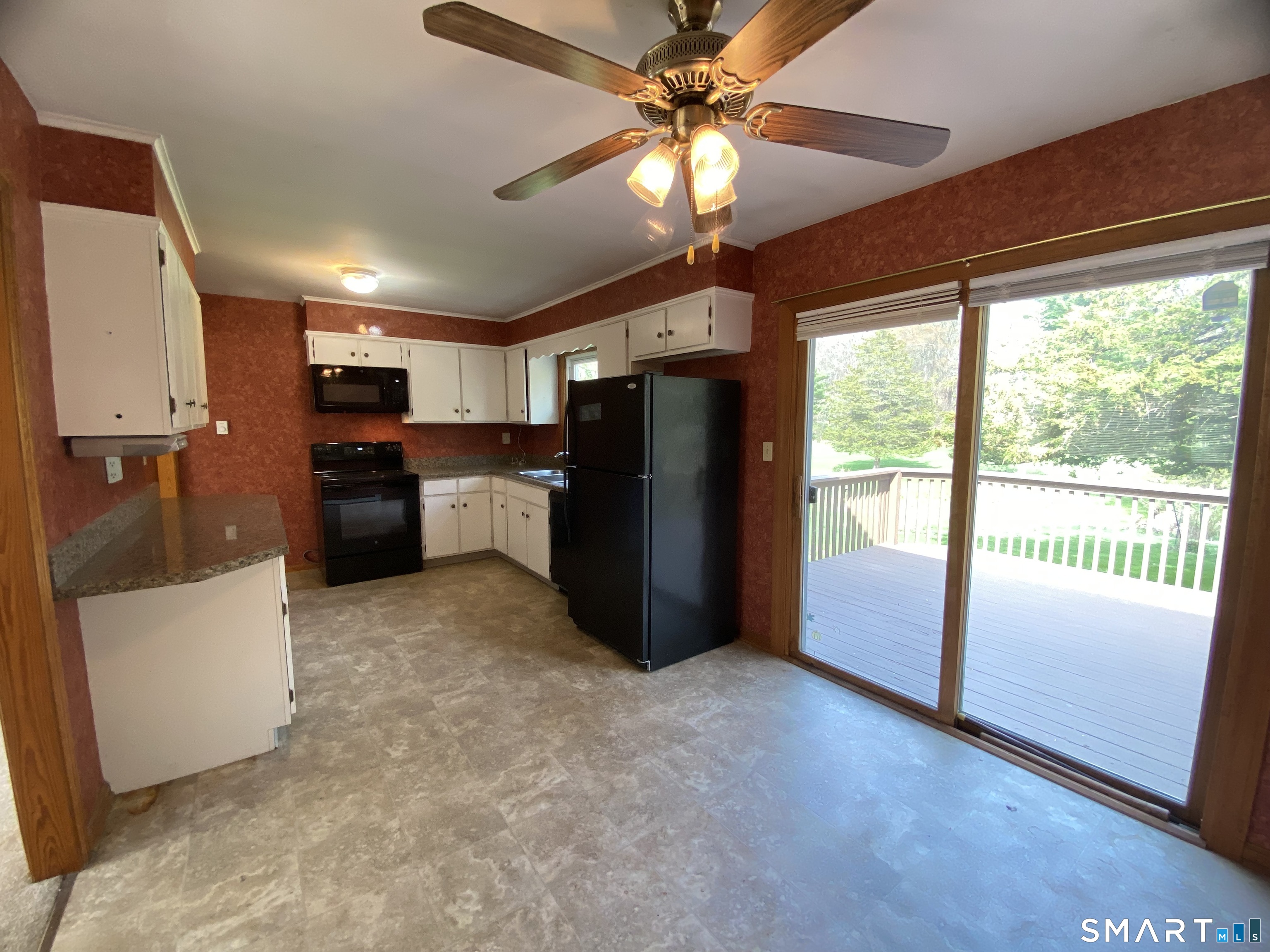 268 Bell Street Middletown, CT 06457 - Photo 3 of 36 a view of a kitchen with a stove cabinets and a kitchen