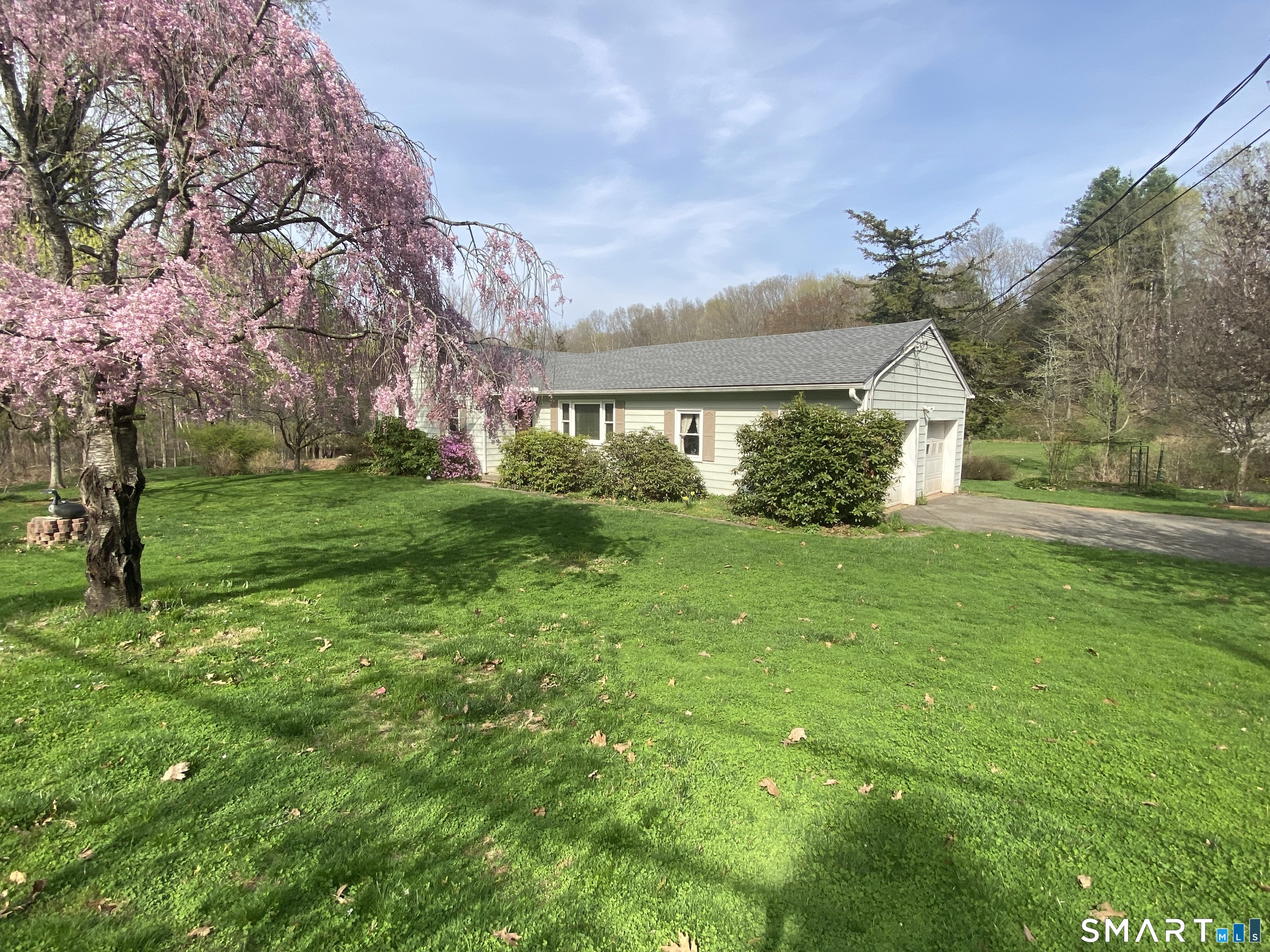 268 Bell Street Middletown, CT 06457 - Photo 35 of 36 a front view of a house with a yard