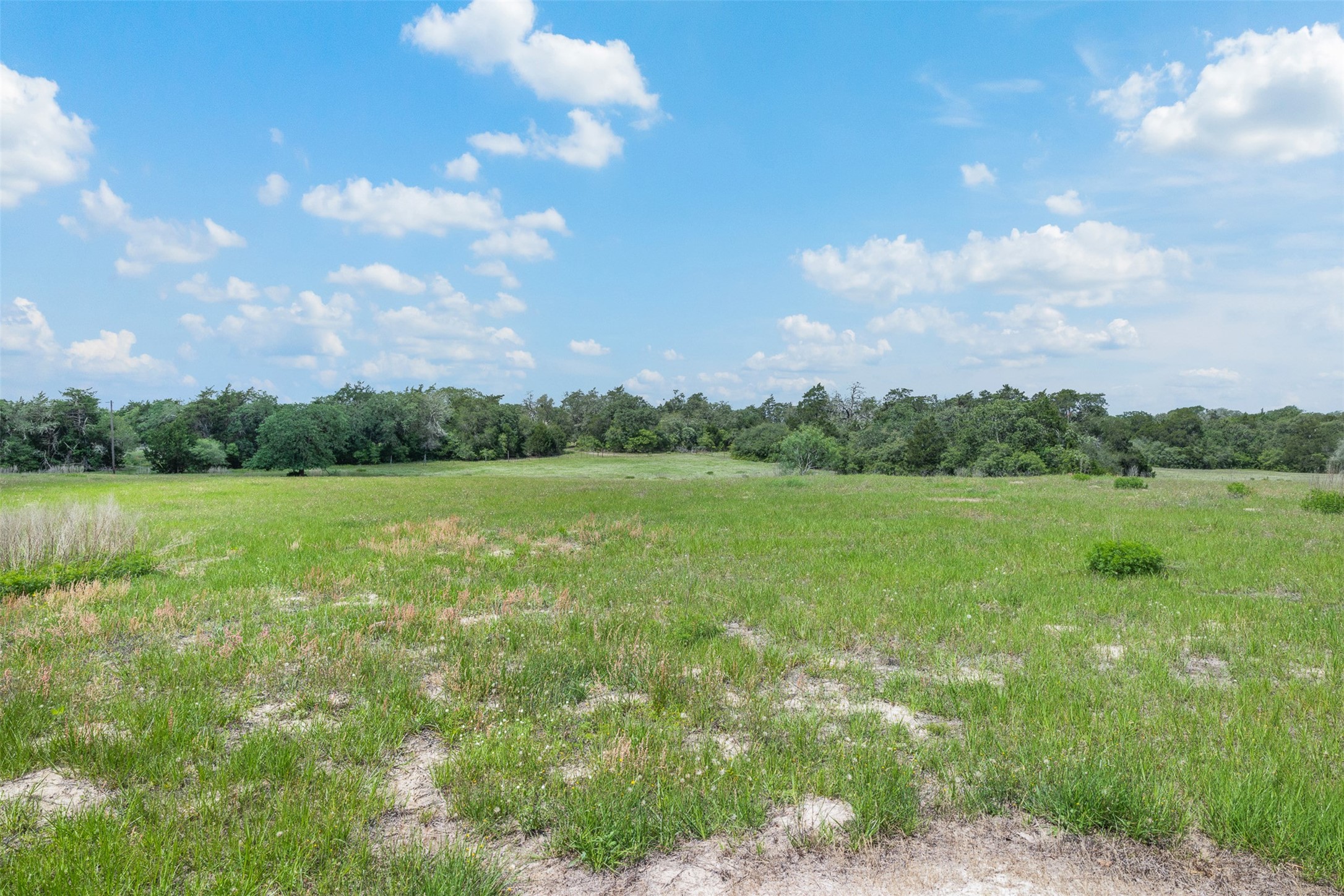 622 Red Rock Ranch Road Red Rock, TX 78662 - Photo 18 of 46 a view of a lake view with a big yard