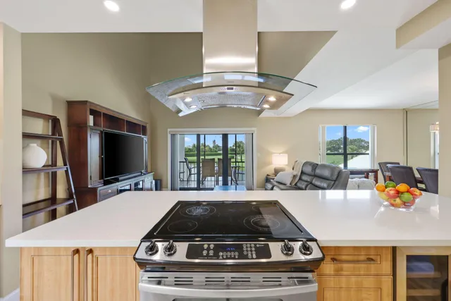 a kitchen with a stove and a sink
