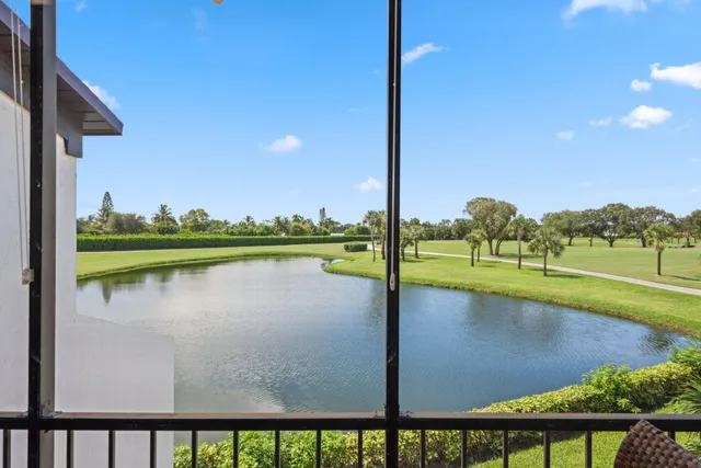 a view of a lake with a big yard