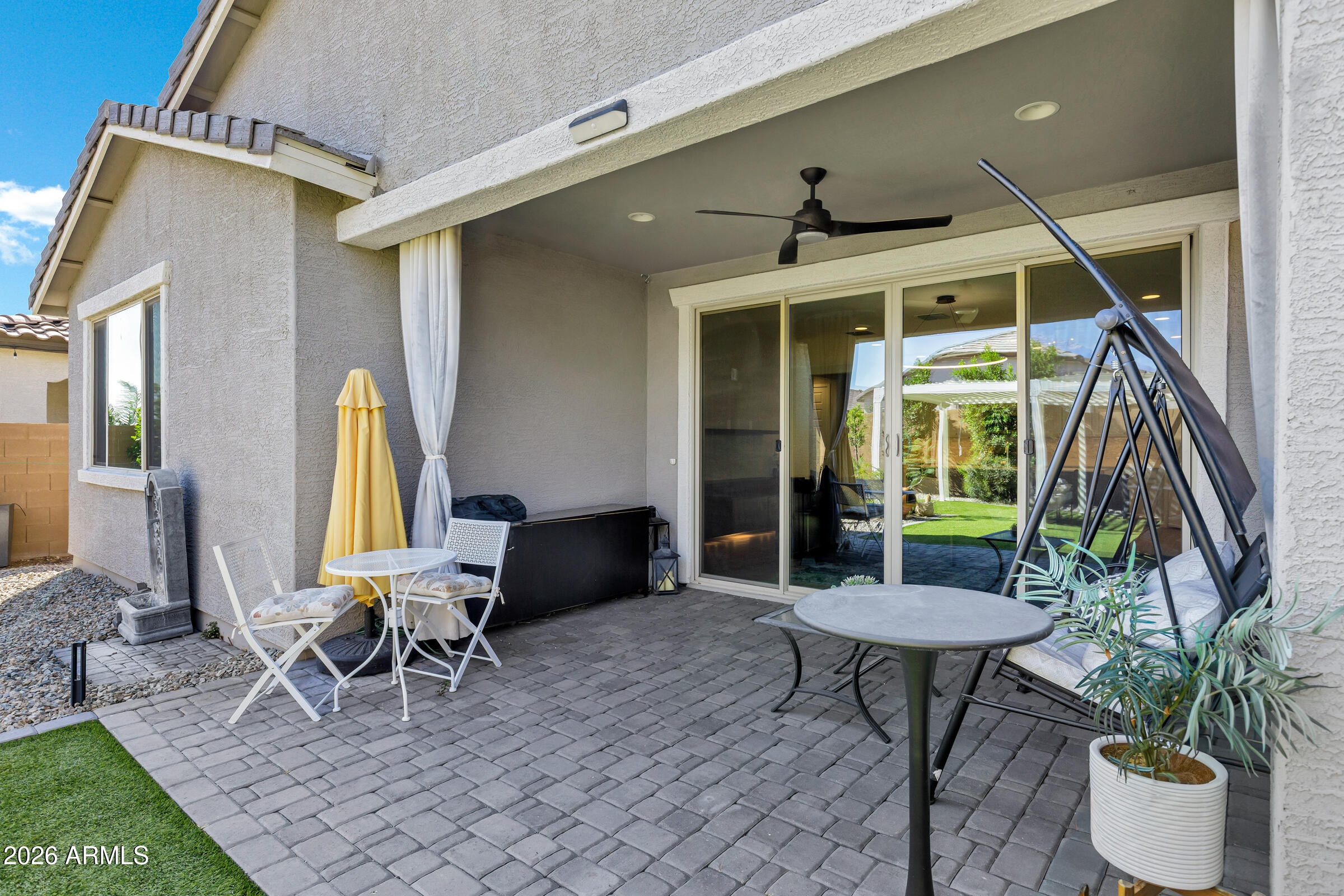 12243 East Sereno Road Gold Canyon, AZ 85118 - Photo 33 of 37 a view of an outdoor dining space with a table and chairs