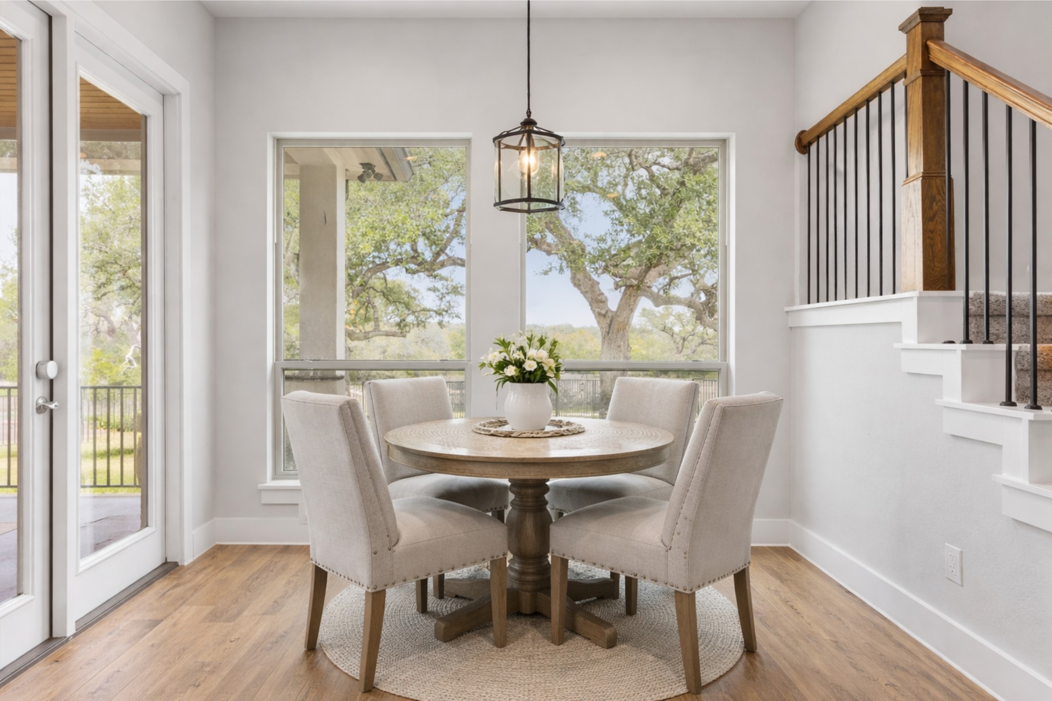 2009 Nature View Loop Driftwood, TX 78619 - Photo 11 of 37 a dining room with furniture window wooden floor