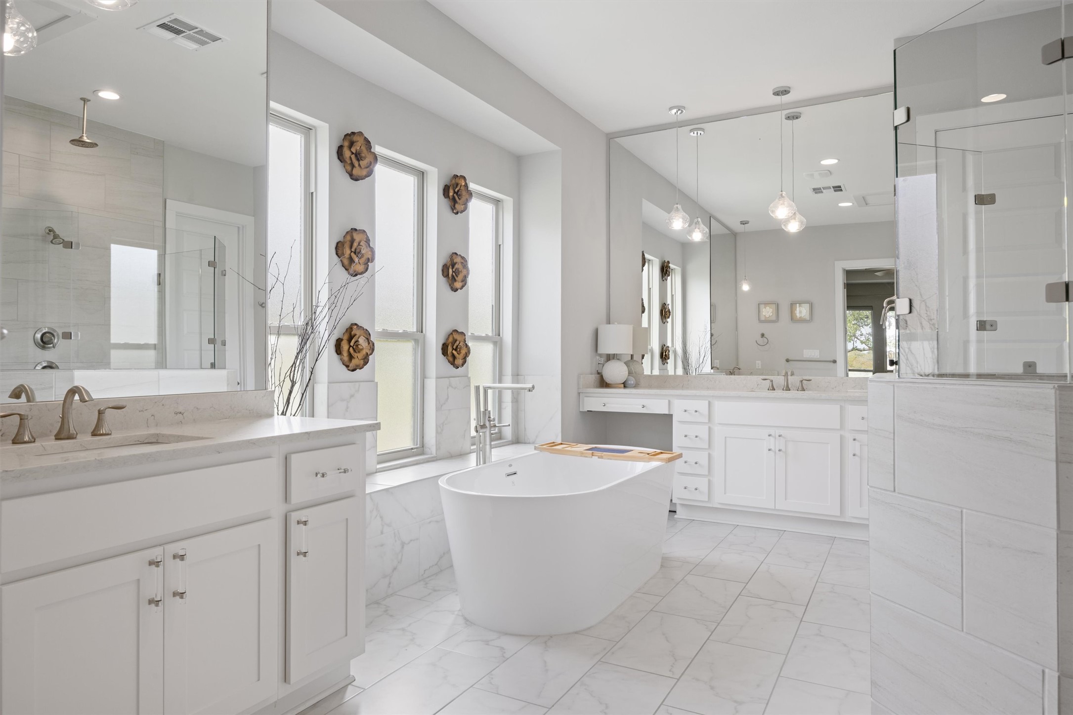 2009 Nature View Loop Driftwood, TX 78619 - Photo 15 of 37 a large white bathroom with a sink a large mirror and a bathtub
