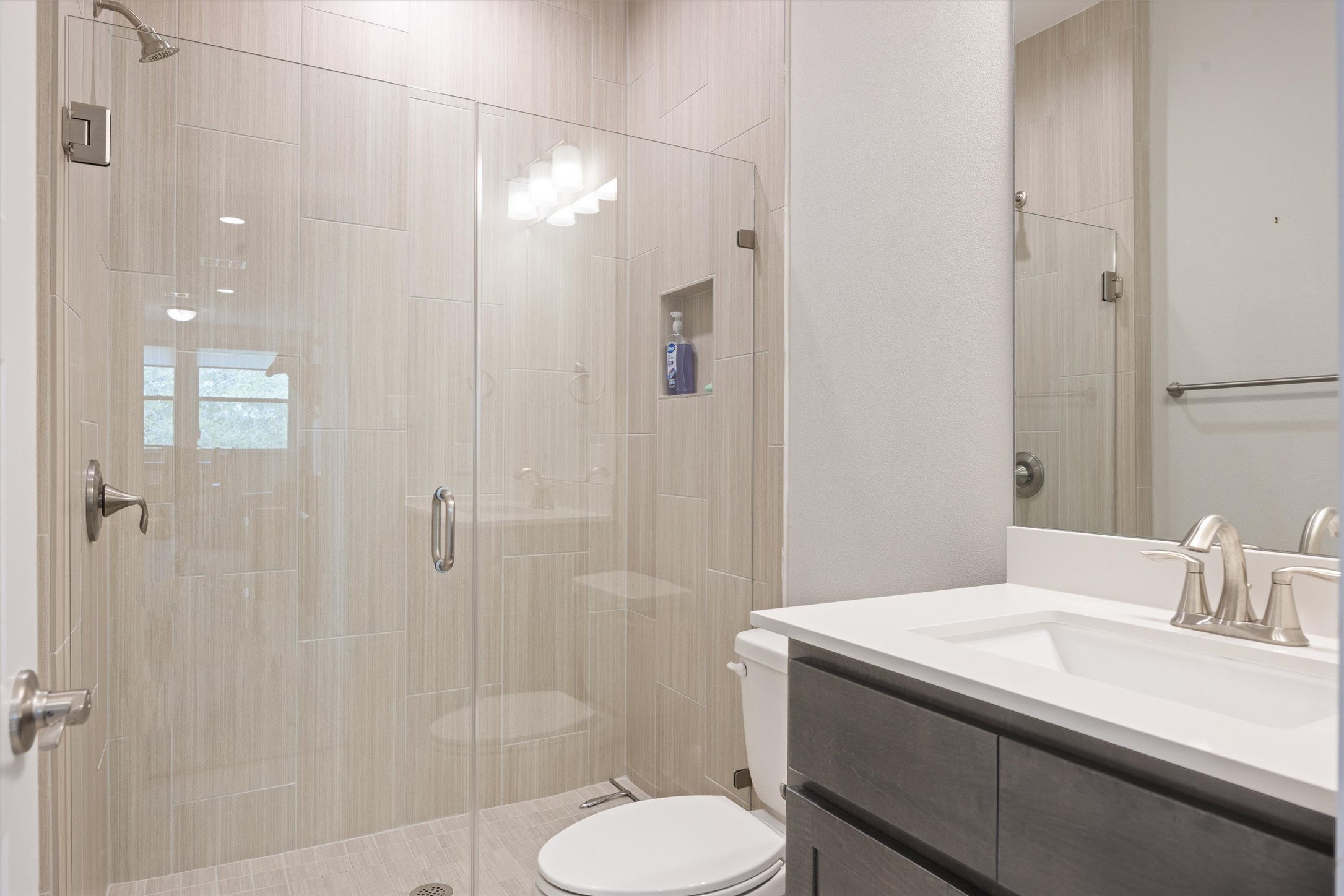 2009 Nature View Loop Driftwood, TX 78619 - Photo 23 of 37 a bathroom with a sink toilet and shower