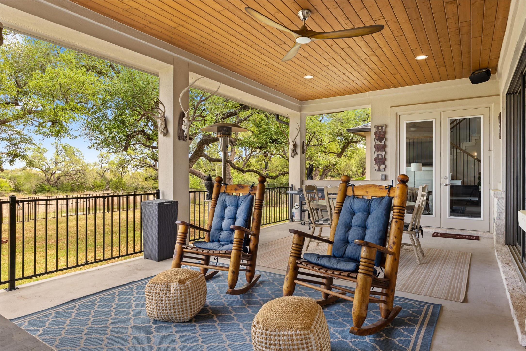 2009 Nature View Loop Driftwood, TX 78619 - Photo 27 of 37 a view of a patio with chairs