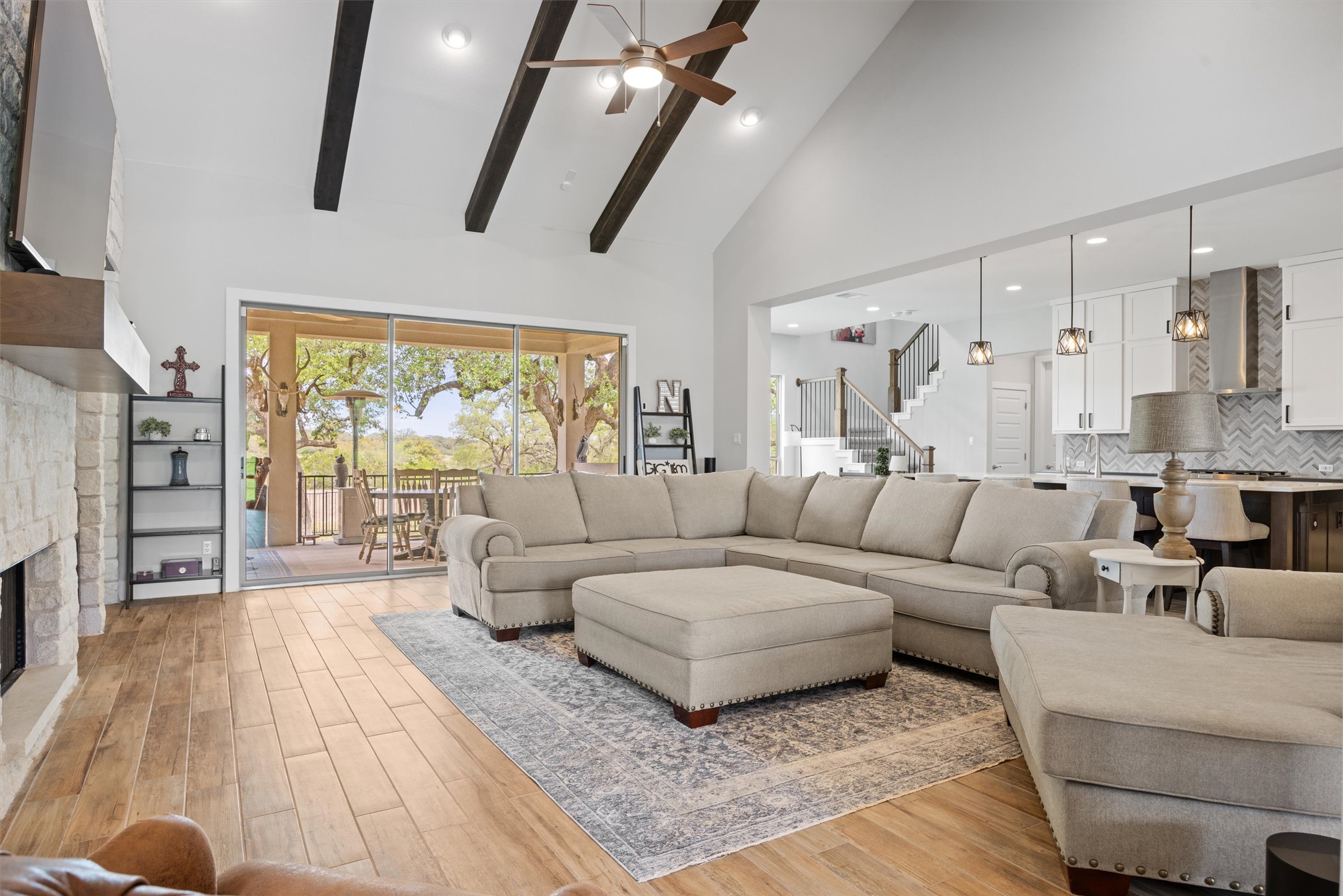 2009 Nature View Loop Driftwood, TX 78619 - Photo 5 of 37 a living room with furniture and a large window