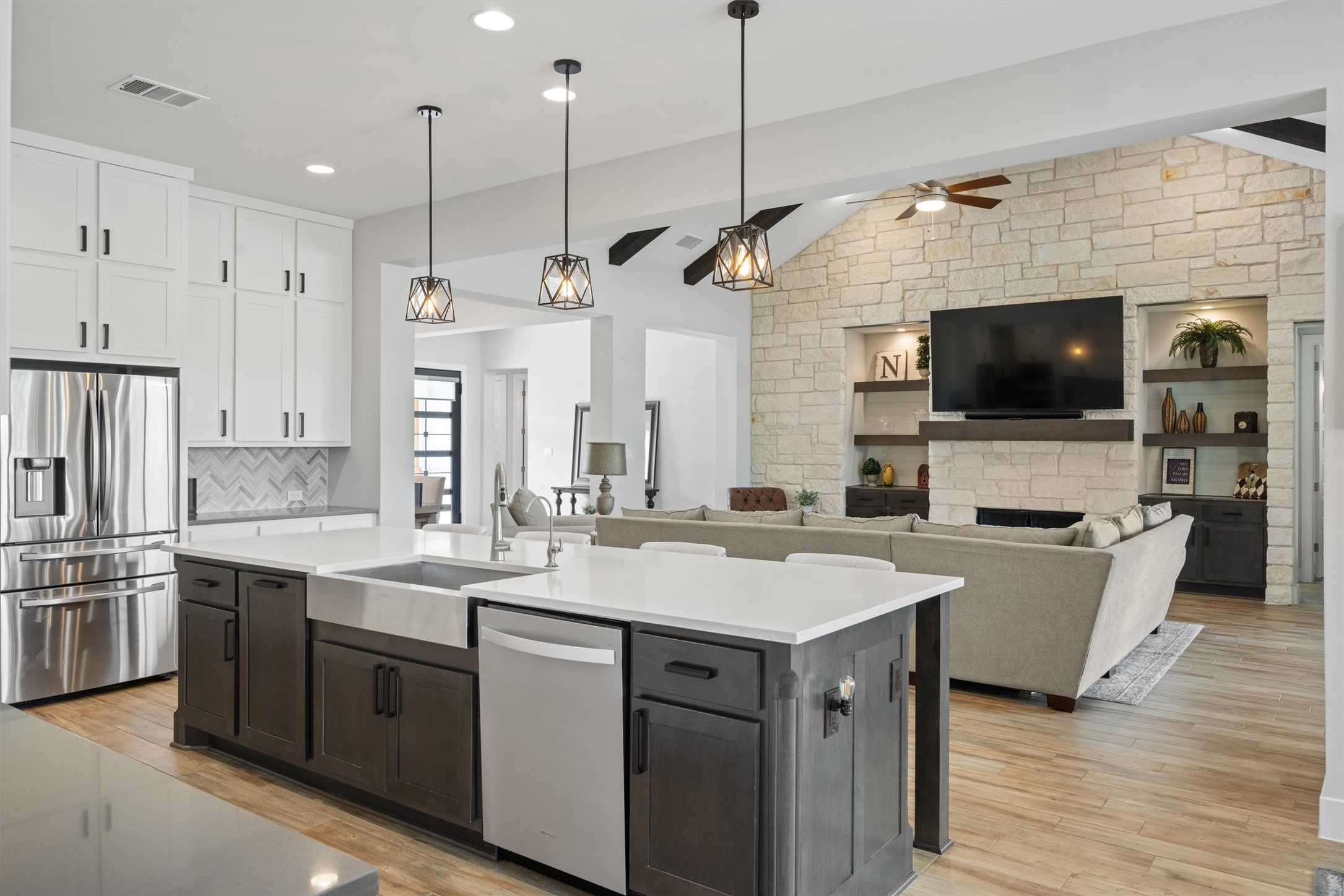 2009 Nature View Loop Driftwood, TX 78619 - Photo 8 of 37 a large kitchen with stainless steel appliances kitchen island a large island in the center