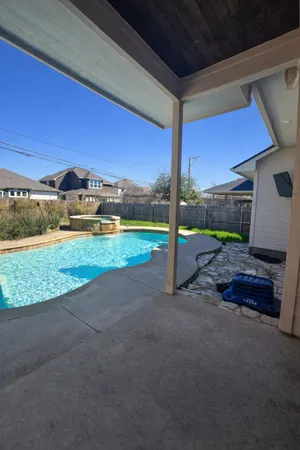 a view of a yard with an outdoor space