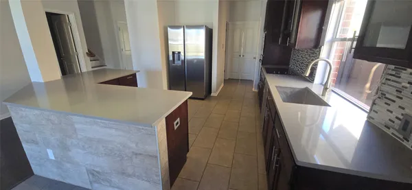 a view of entry way with wooden floor