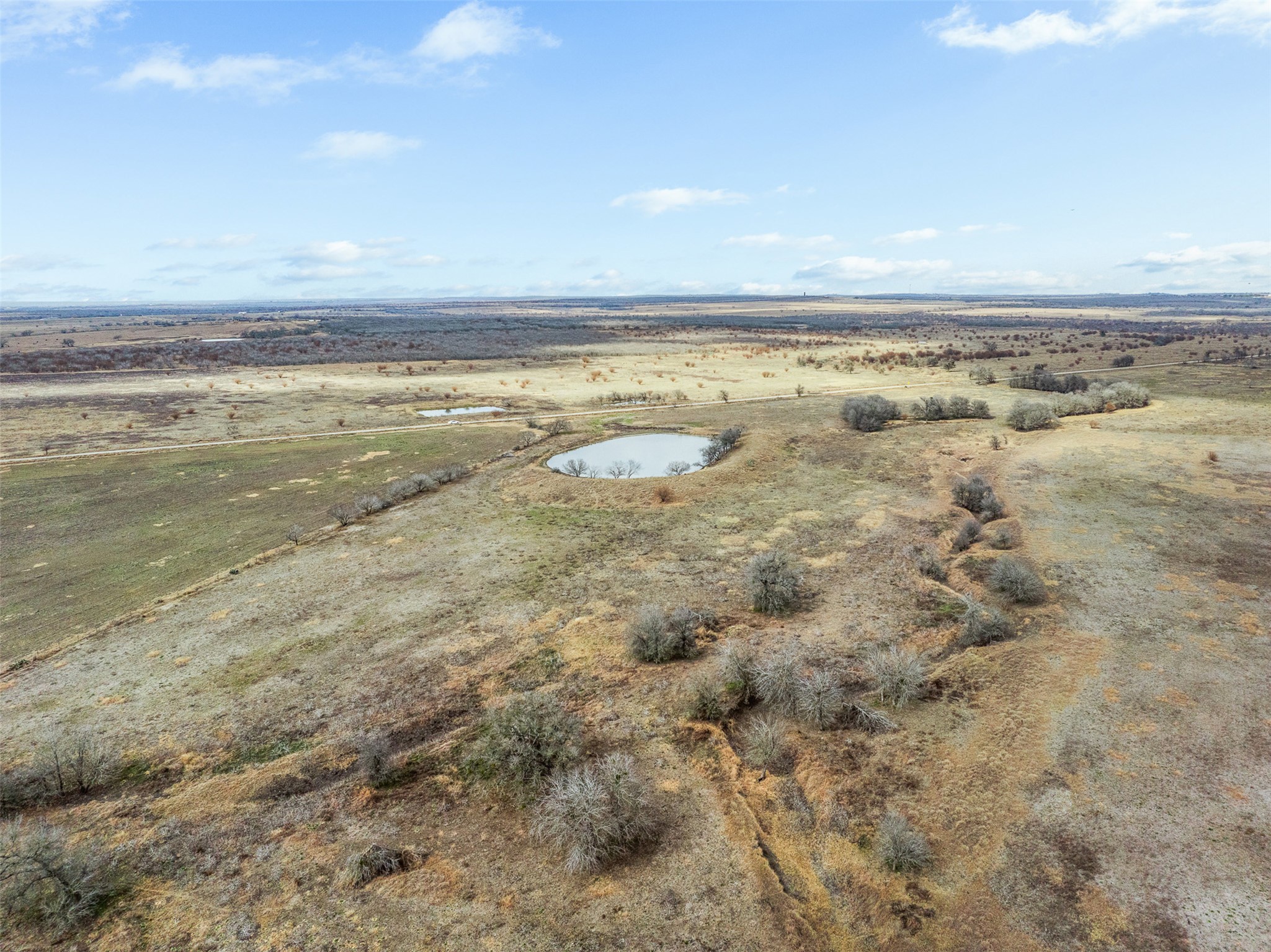 0 Political Road Lockhart, TX 78644 - Photo 4 of 31 Aerial view of sparsely populated area featuring a large body of water