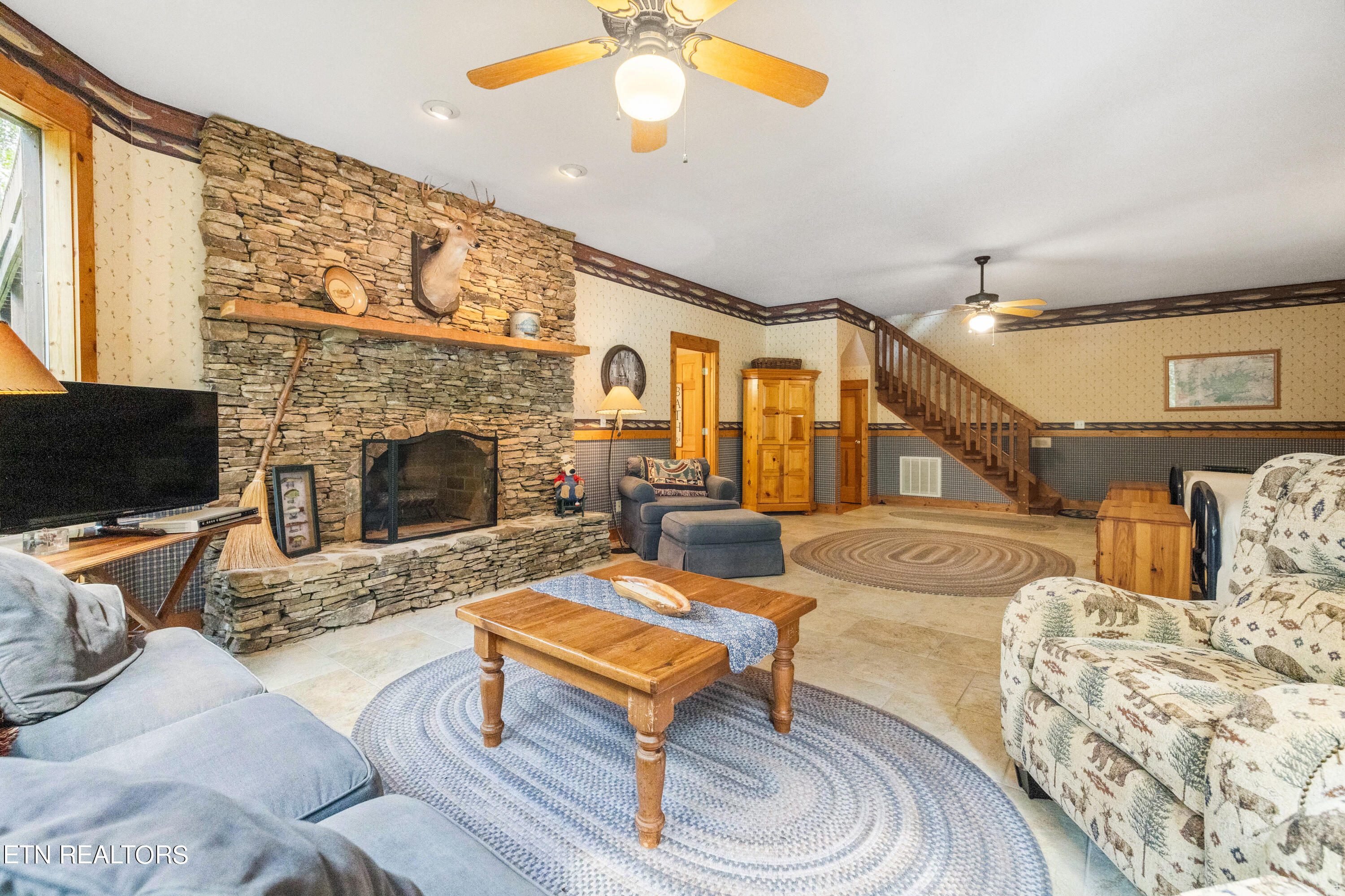 190 Ridgeview Circle Sharps Chapel, TN 37866 - Photo 36 of 58 Lower level wood burning fireplace