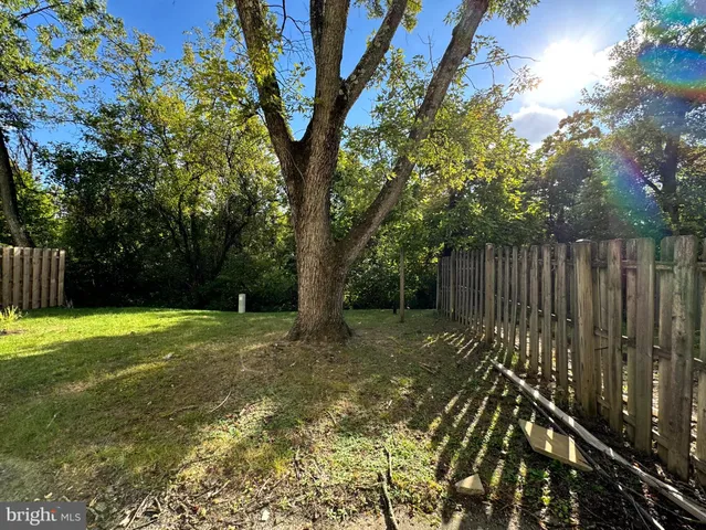 a view of backyard with green space
